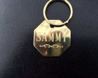 Solid Brass 1 inch octagon tag with a curley decoration