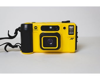 Minolta Weathermatic Dual 35mm Film Camera in Excellent Condition and Original Case, Strap Film Containers