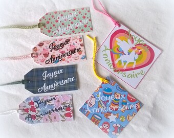 6 matching happy birthday labels