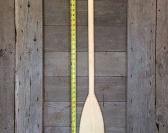 40 inch long flat bottomed unpainted canoe paddle. handcrafted