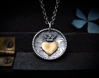 keep it safe ... mixed metal pendant