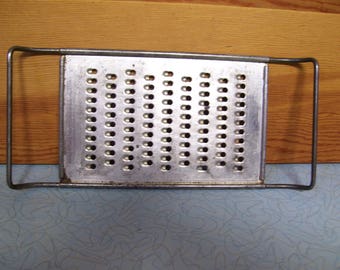 Vintage metal grater