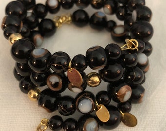 Black And Gold Wrap Around Bracelet .