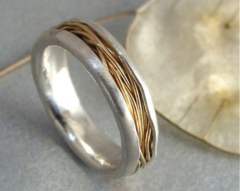 intertwined ... 14k gold and silver ring