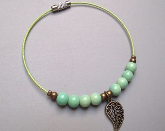 Handmade bracelet pistachio green glass beads.