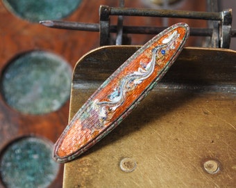 Antique metal parts of old jewelry, brass part with enamel