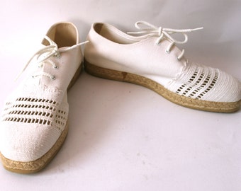 White canvas flats pumps ladies shoes with 1920s styling with espadrilles soles
