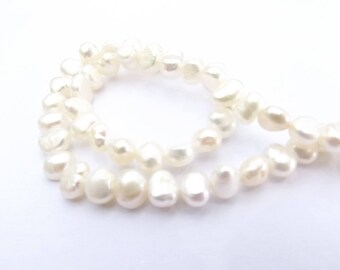 58 LAO-514 irregular 5-6 mm white fresh water pearls