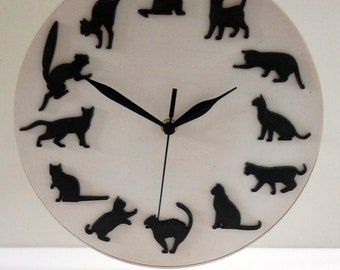 Multilayer wooden clock with black cats