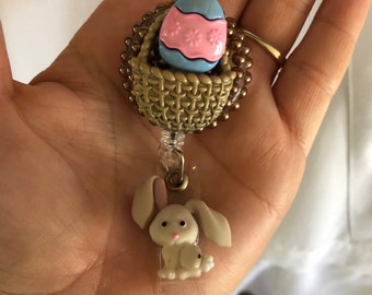 White easter bunny with basket of eggs