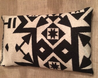 Neck wrap make with Pendleton remnants. Can be used hot or cold. For heat-3 minutes in the microwave. For cold: freezer 1 hr...brrrr....
