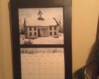Primitive calendar holder