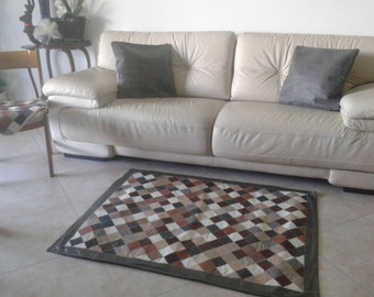 tappeto patchwork in vera pelle.