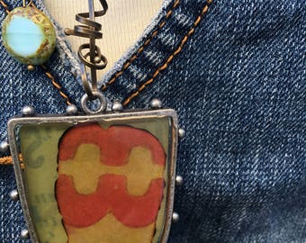 Heavy, industrial look glass abstract pendant