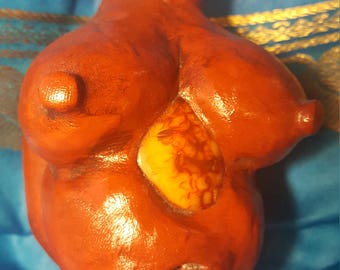 Goddess figurine with carnelian inlay