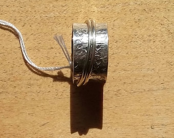 Embossed silver ring