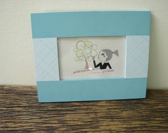 paper stripe and blue photo frame
