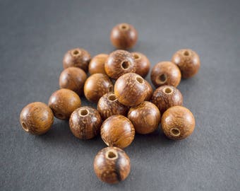 4 pcs - ethnic, natural Bayong wood round spacer beads 8mm •