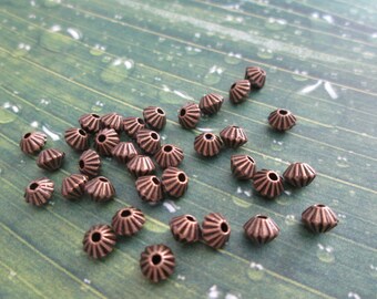 set of 20 beads bicones 5 x 4 mm antique bronze