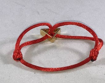 Charm bracelet on silk string