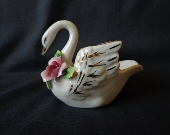 Porcelain swan figurine