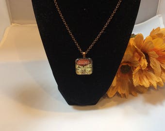 Very long brass necklace with glass pendants