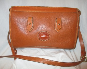 Dooney & Bourke all weather leather cross body bag