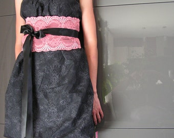 Woman black dress and lace obi belt in coral.3411