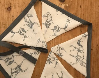 Handmade bunting in 'joys of spring' by Robin Roadnight.