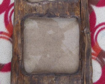 Rustic,driftwood style frame in locally sourced,recycled pine in medium oak/antique pine beeswax finish.To fit three 150mm square