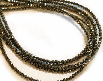 Golden pyrite 2mm micro-faceted rondelles. Select a strand length.