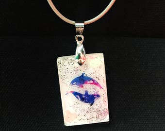 Enamored killer whales pendant