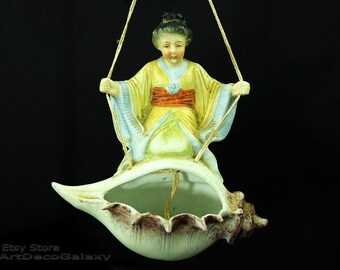 Antique German Bisque Japanese Girl Swinging on a Shell