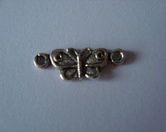 In between with a silver coloured metal Butterfly