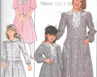 Butterick sewing pattern 5747 for a girls dress size 12-14.