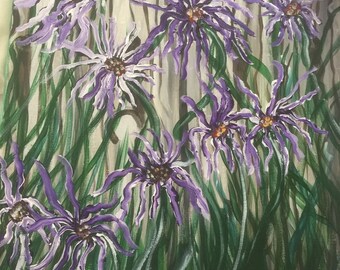 Purple Wildflowers against weathered fence