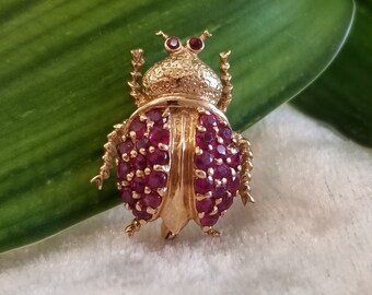 14 K yellow gold ruby ladybug pin