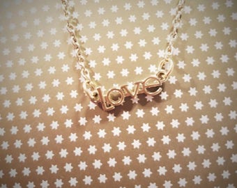 Gold love necklace