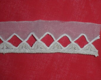 Tape ecru sewing cotton and tulle
