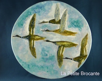 Flat ceramic signed décor of ducks in flight