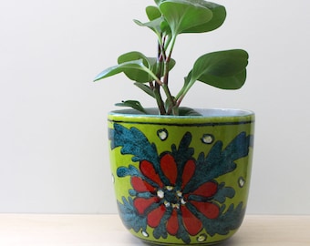 Vintage pottery planter, Red flower on green.