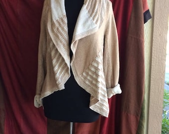 beige & white cardigan sweater with asymmetrical design synthetic fibers no buttons long sleeves very soft