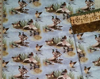Wildlife pillowcase featuring ducks in water with brown trim at opening