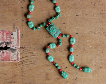 Antique 1920s Czech glass Egyptian Revival Pharaoh and scarab sautoir necklace