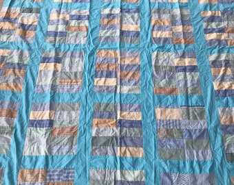 Vintage quilt top in shades of blue