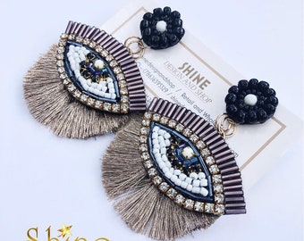 Embroidery handcrafted earrings evil eye