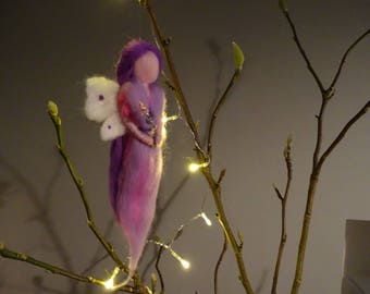 Here is Sparkle. She's made from fine soft merino wool. Waldorf inspired.