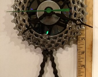 Recycled bike parts clock with pendelum
