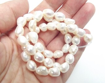 32 LAO-574 irregular 7-9 mm white fresh water pearls