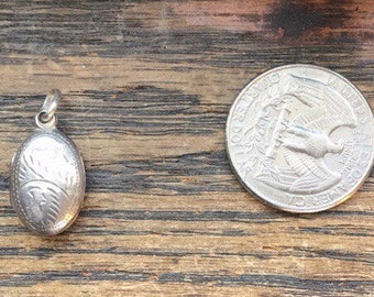 Sterling silver engraved oval locket